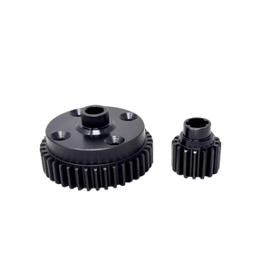 Two black metal gears on a white background