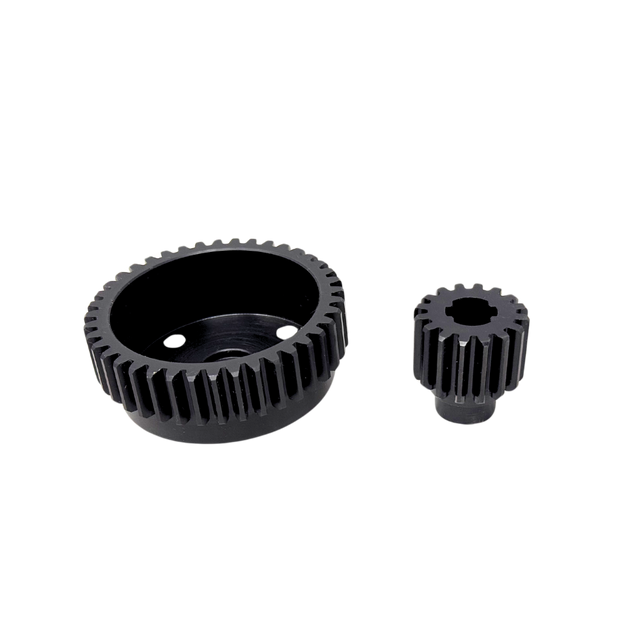 Two black metal gears on a white background