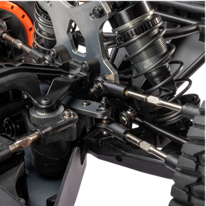 Close-up of a mechanical component with springs and metal parts on a white background