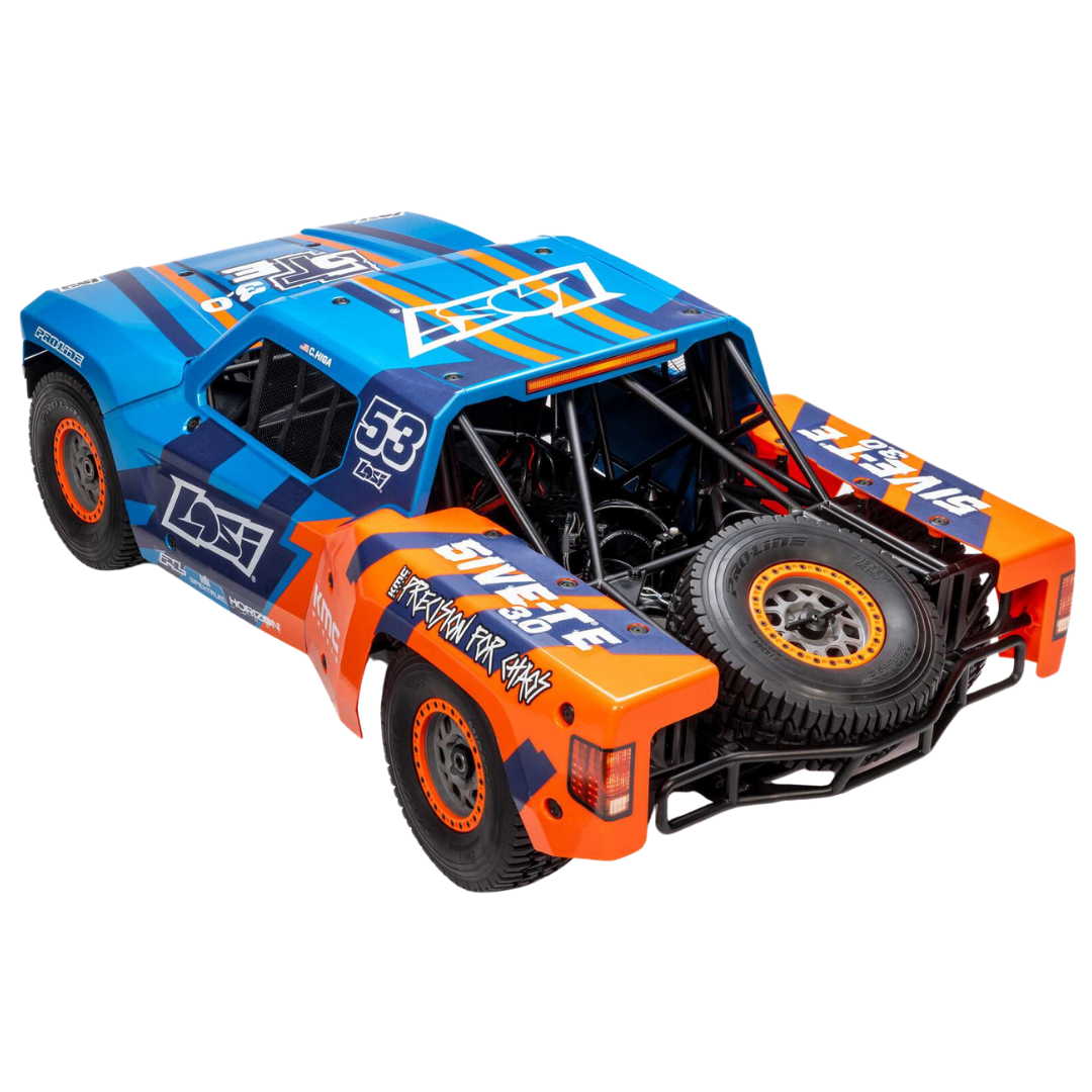 Model off-road truck with blue and orange design on a white background