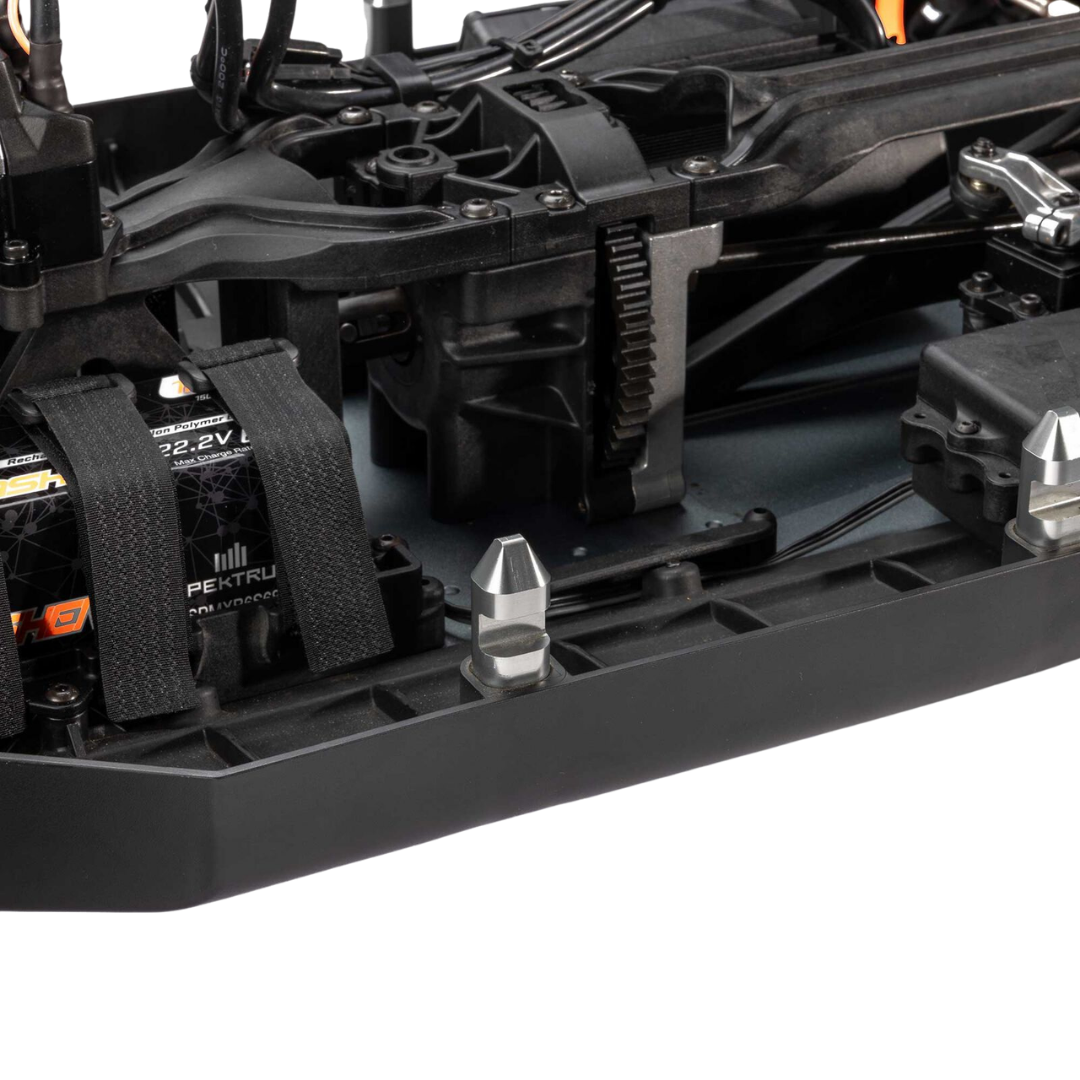 Close-up of a black mechanical component with visible branding on a white background