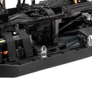 Close-up of a black mechanical component with visible branding on a white background
