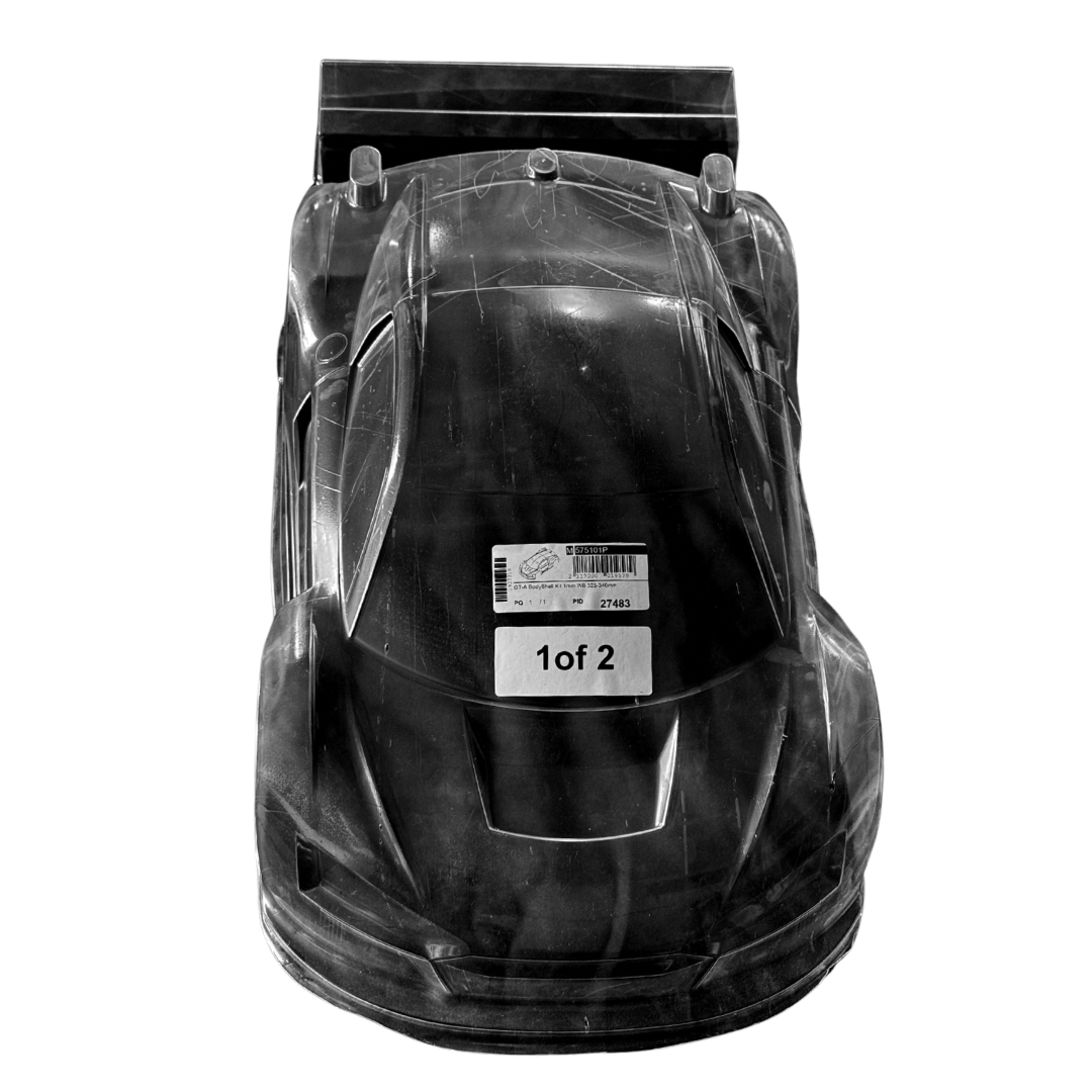 Black toy car in clear packaging on a white background