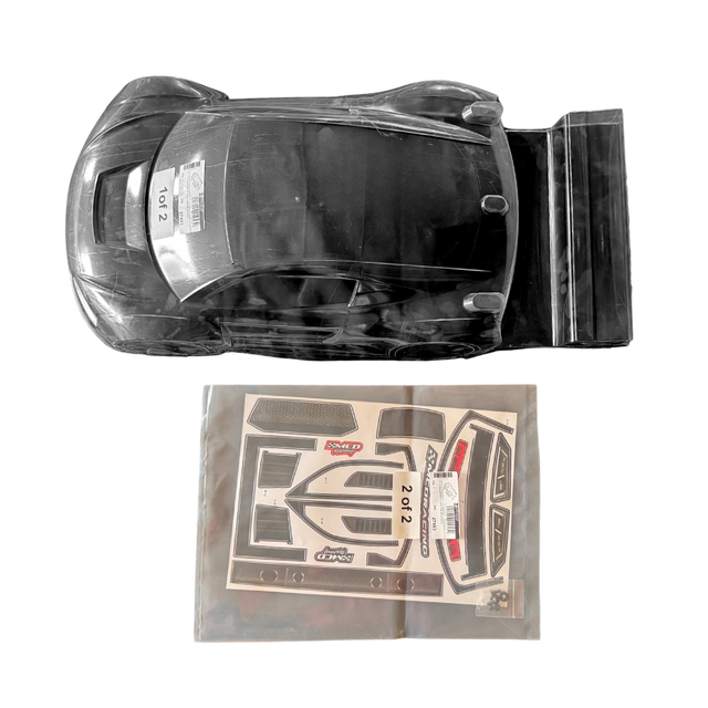 Clear plastic car model with a set of decals on a white background