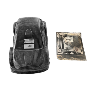 Black plastic car seat base with clear cover and additional packaging on a white background