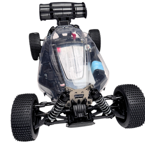 Model of a four-wheeled vehicle with a transparent front section on a white background
