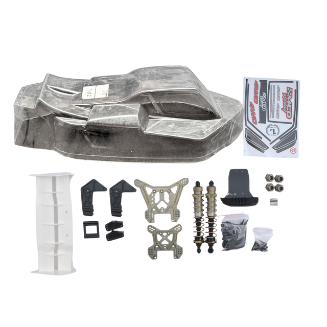 Collection of RC car parts including a body shell, suspension components, and a box on a white background.