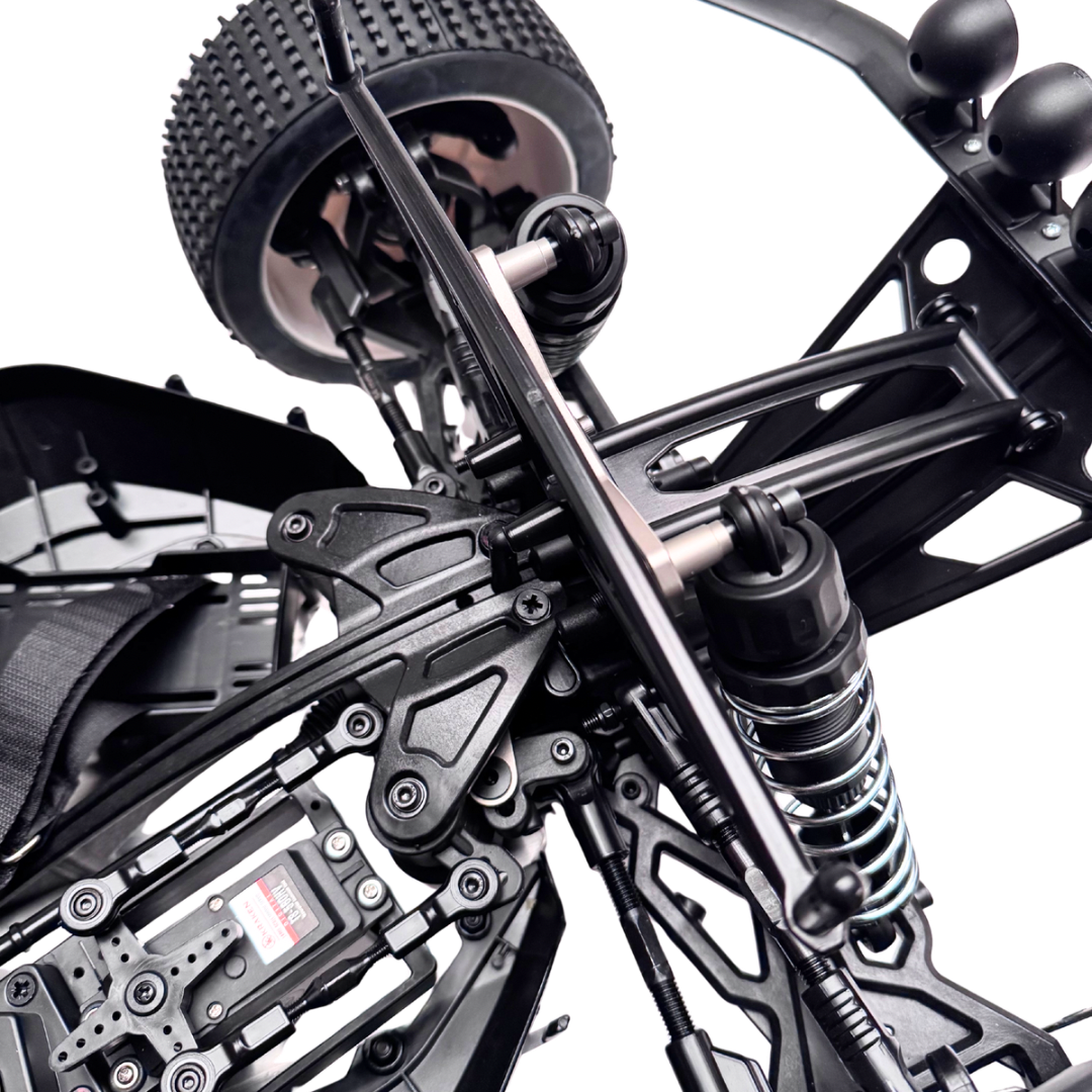 Close-up of a black off-road vehicle suspension system on a white background