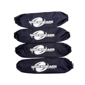 Four black shock absorber covers with 'SHOCKWEARS' logo on a white background
