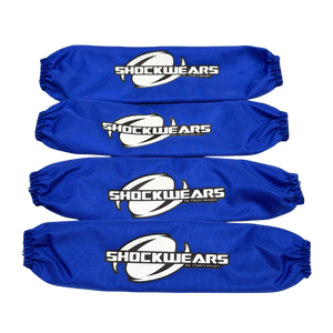Four blue shock absorber covers with 'Shockwears' branding on a white background