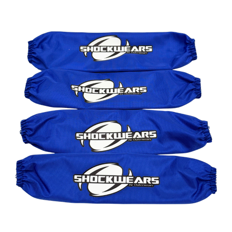 Four blue shock absorber covers with 'Shockwears' branding on a white background