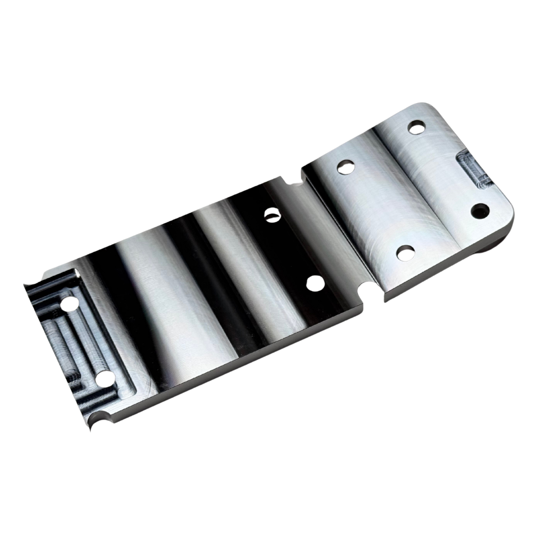Angled view of Outlaw V4 Billet Hybrid Slider kit version front chassis insert in raw silver aluminium