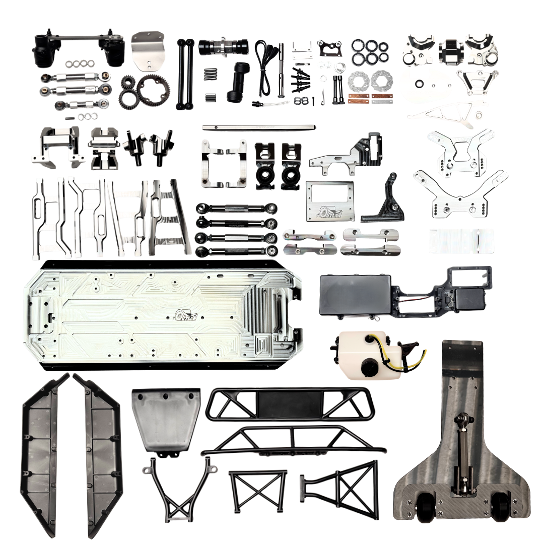 Full contents of the Outlaw V4 Billet Hybrid Slider kit version laid out including chassis, arms, towers, wheelie bar and hardware
