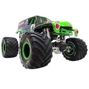 Green monster truck with large black tires on a white background