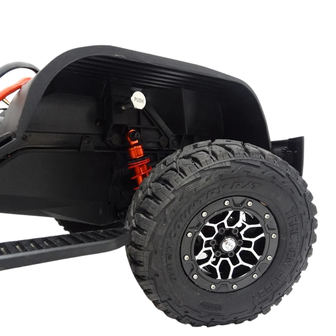 Close-up of a black off-road vehicle tire with a white background