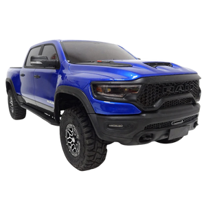 Blue pickup truck with black grille on a white background