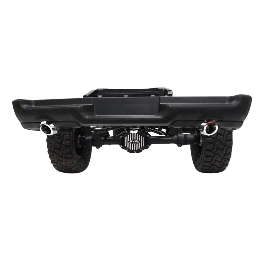 Black off-road vehicle bumper with tires on a white background