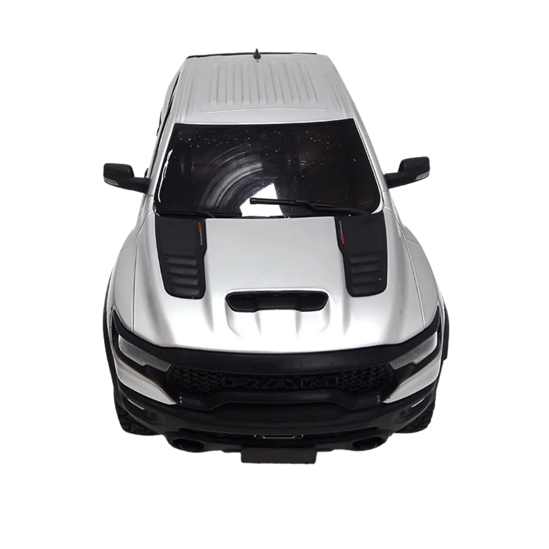 Model car with black and silver design on a white background