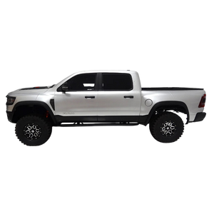 silver pickup truck with black accents on a white background