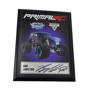 Framed collectible featuring a monster truck with 'Primal RC' branding on a white background