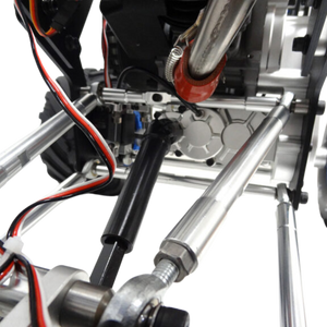 Close-up of a mechanical device with metal components and wiring on a white background