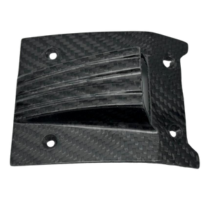 Carbon fiber panel with a textured surface on a white background