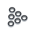 Six metal bearings arranged in two rows on a white background