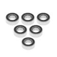 Set of six metal bearings on a white background
