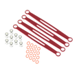 Red metal brackets and small components on a white background