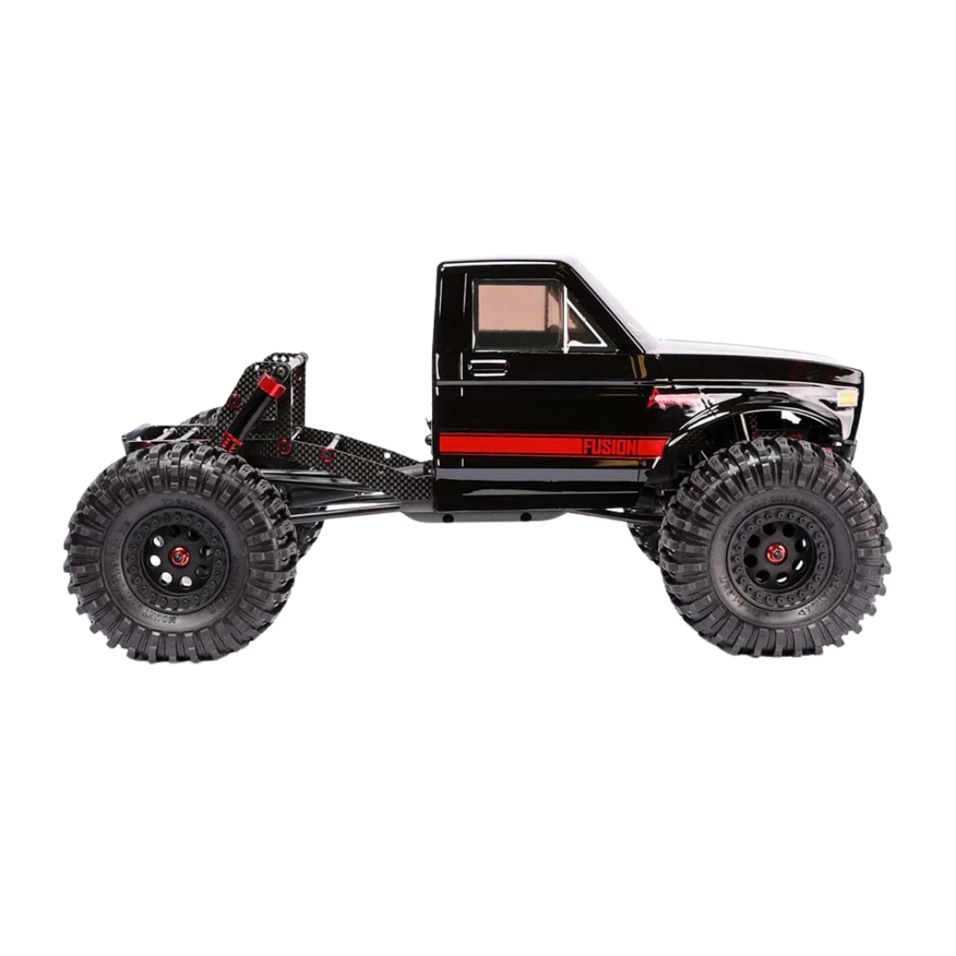 Black off-road toy truck with large wheels on a white background