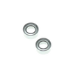 Two metal bearings on a white background