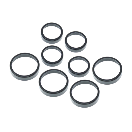 Set of black mechanical seals on a white background