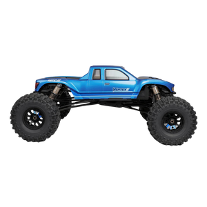 Blue monster truck with large wheels on a white background
