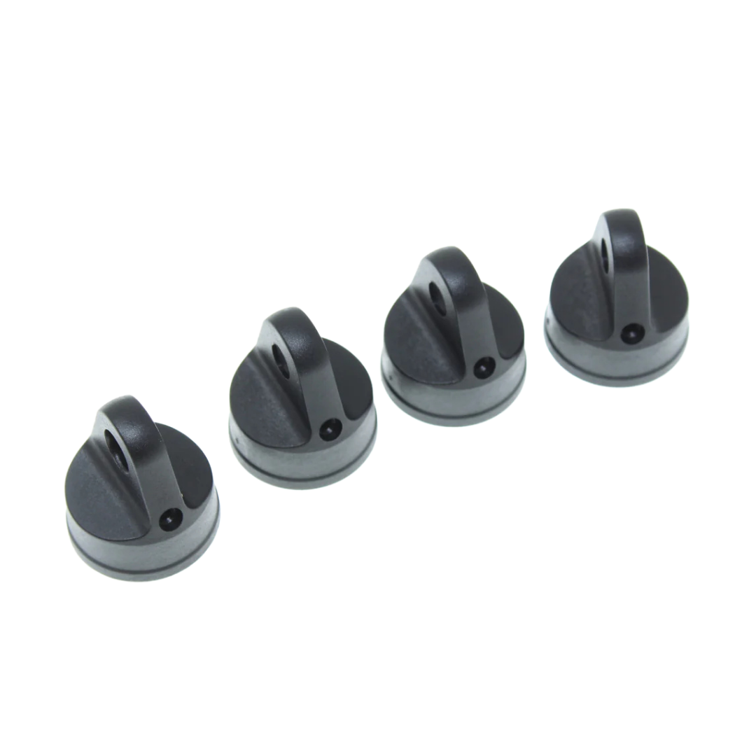 Four black caps on a white background