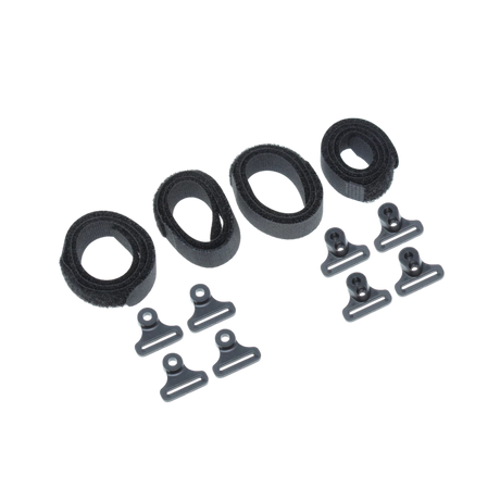 Set of black plastic clips and loops on a white background