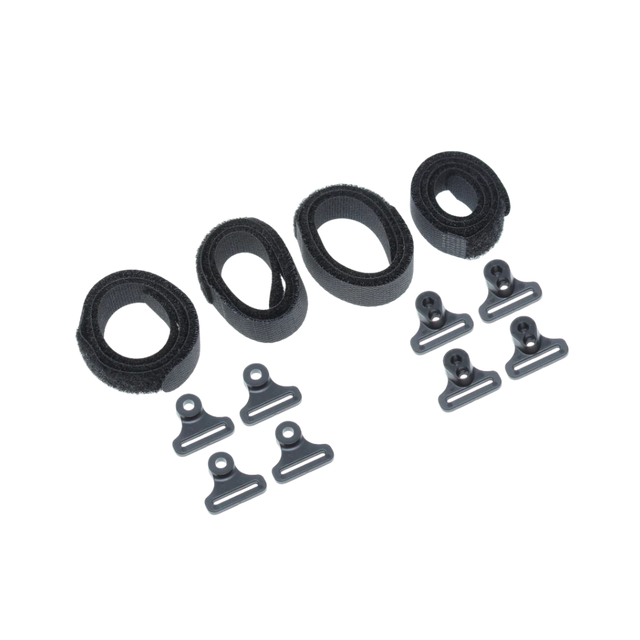 Set of black plastic clips and loops on a white background