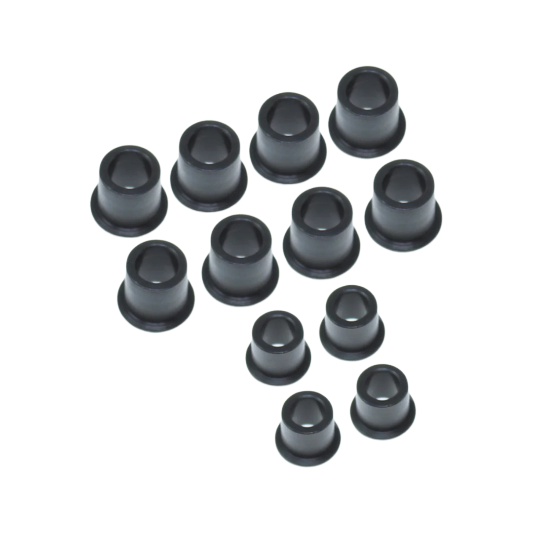 Set of black bushings on a white background