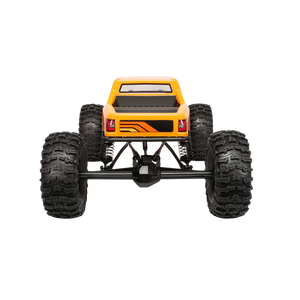 orange monster truck with large black tires on a white background