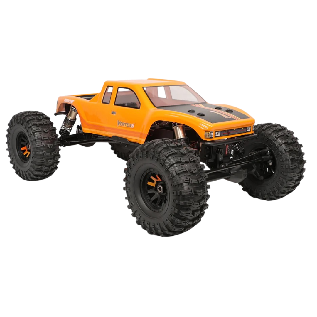 Orange monster truck with large black tires on a white background