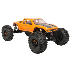 Orange monster truck with large black tires on a white background
