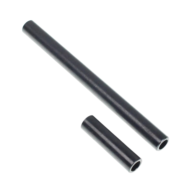 Two black cylindrical objects on a white background