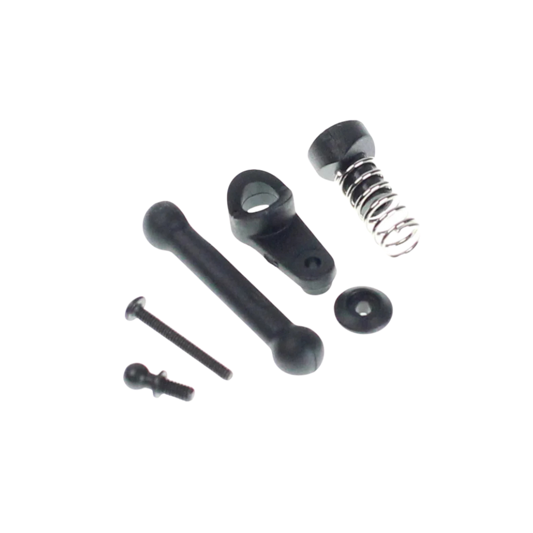 Mechanical parts including a spring, shafts, and bearings on a white background
