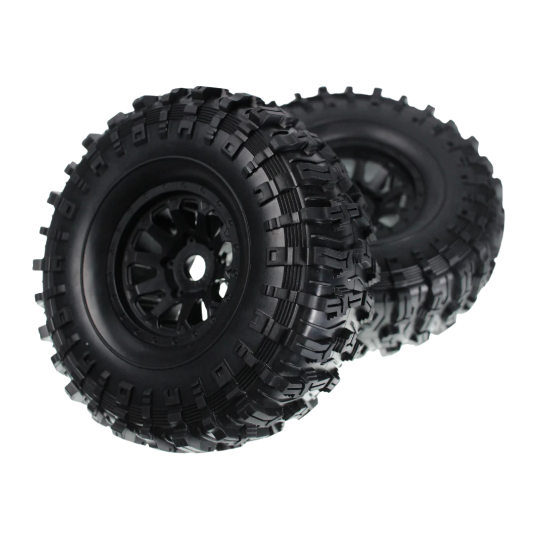 Two black off-road tires with tread patterns on a white background