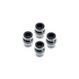 Set of four black and silver cylindrical objects on a white background