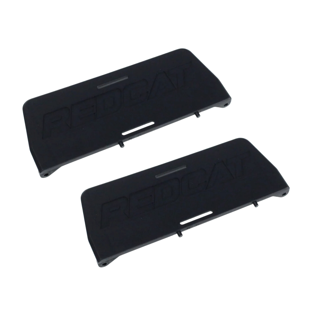 Two black plastic components with branding on a white background