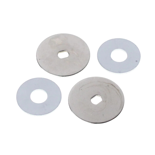 Four circular metal washers on a white background