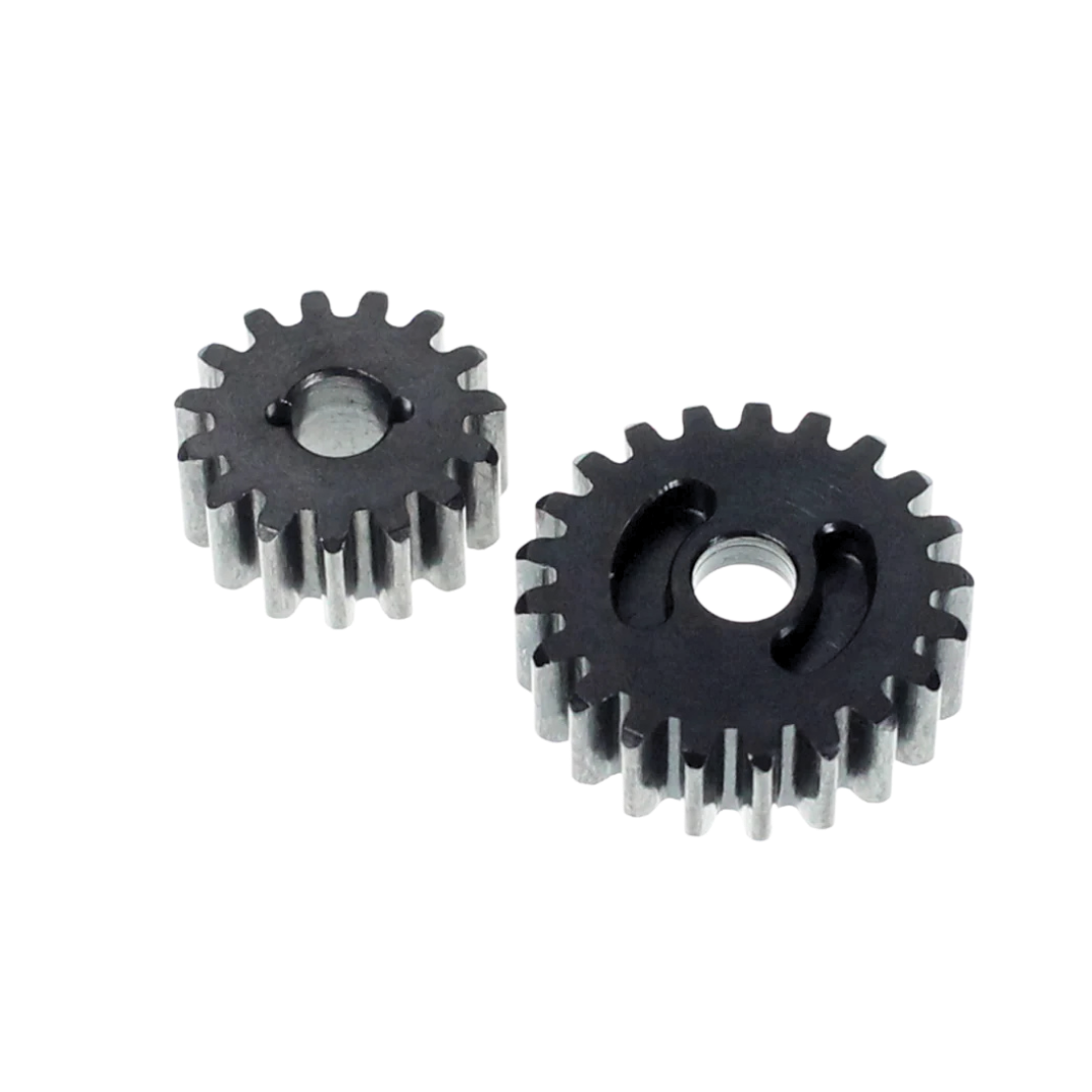 Two metal gears on a white background