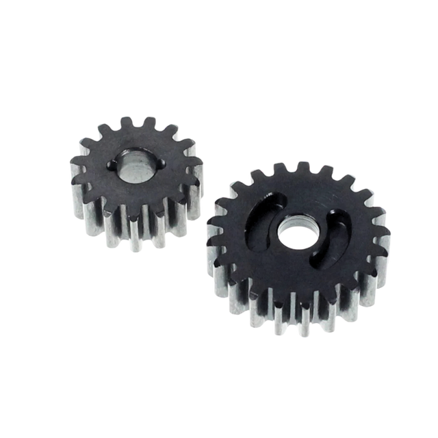 Two metal gears on a white background