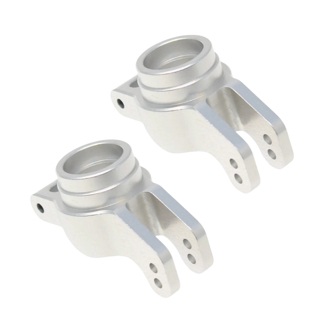 Two metallic mechanical components on a white background