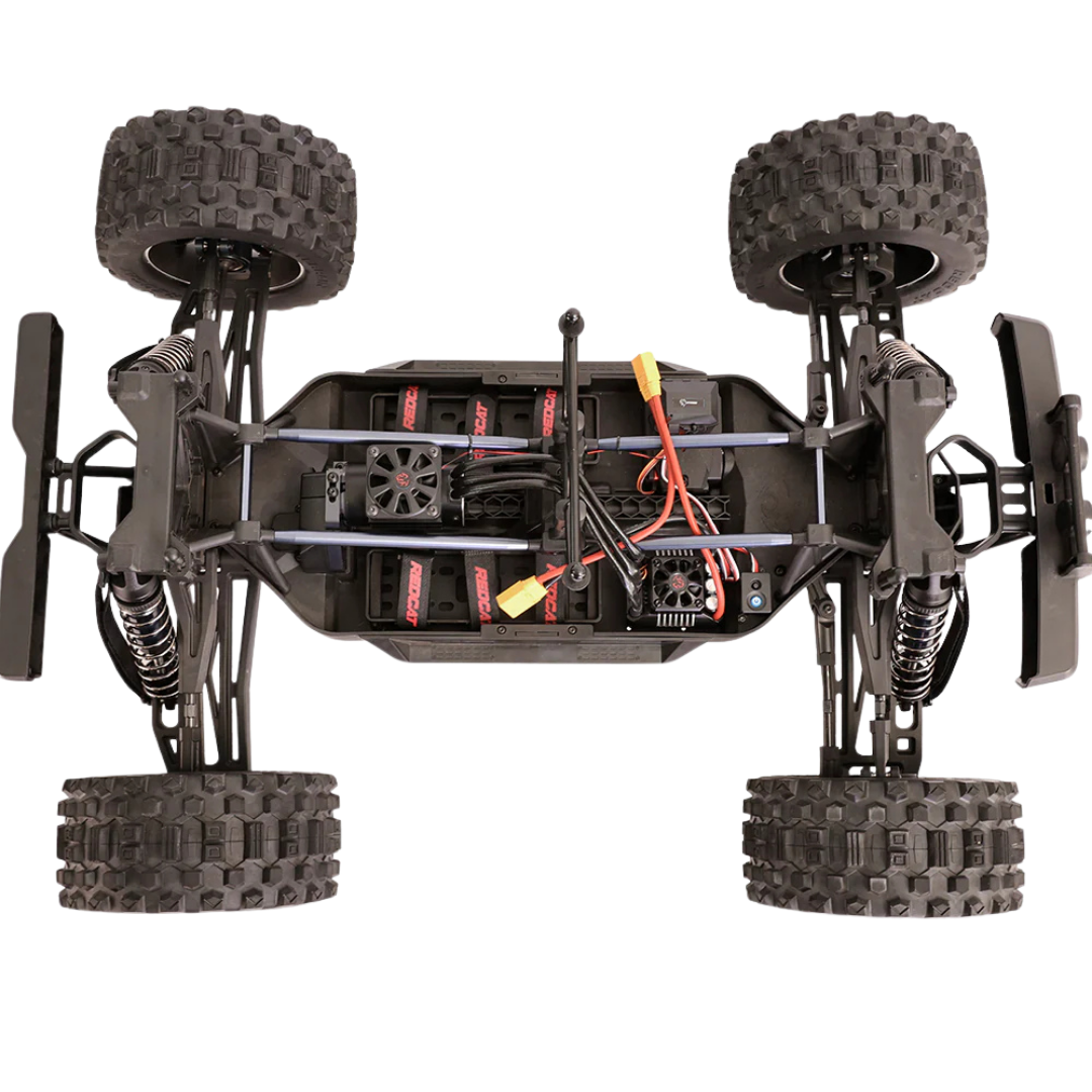 Top-down view of a remote control car chassis with visible wiring on a white background